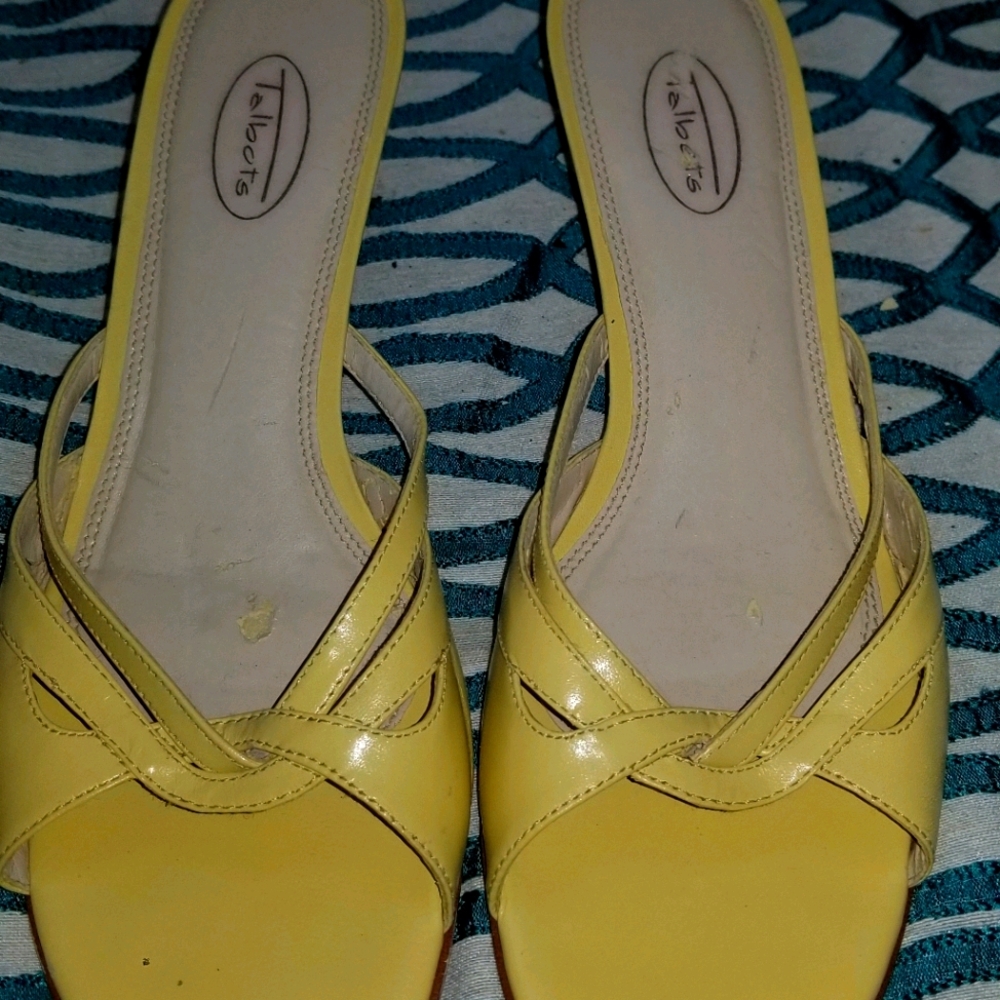 Women is beautiful yellow slip on sandals